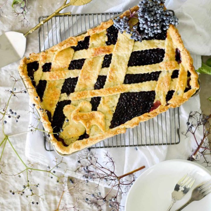 Elderberry pie with lattice detailed crust.