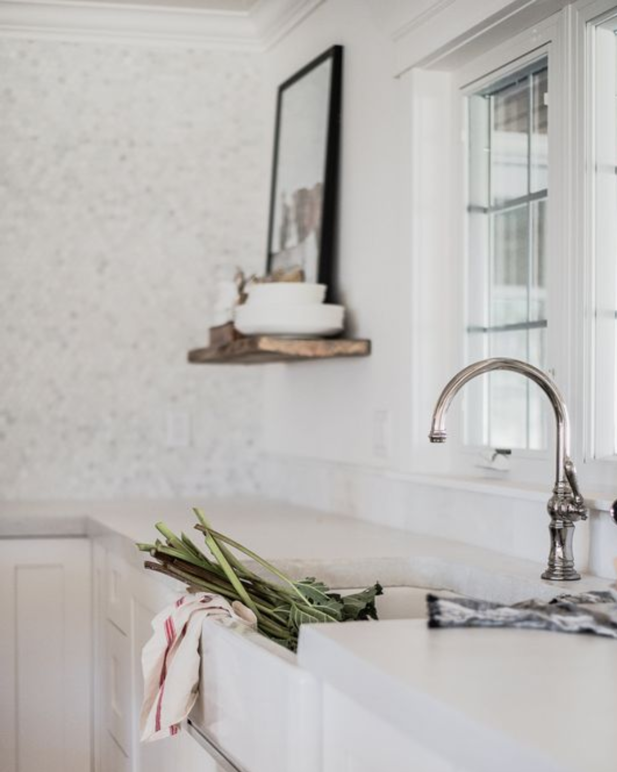 White concrete countertops in a beautiful kitchen setting.