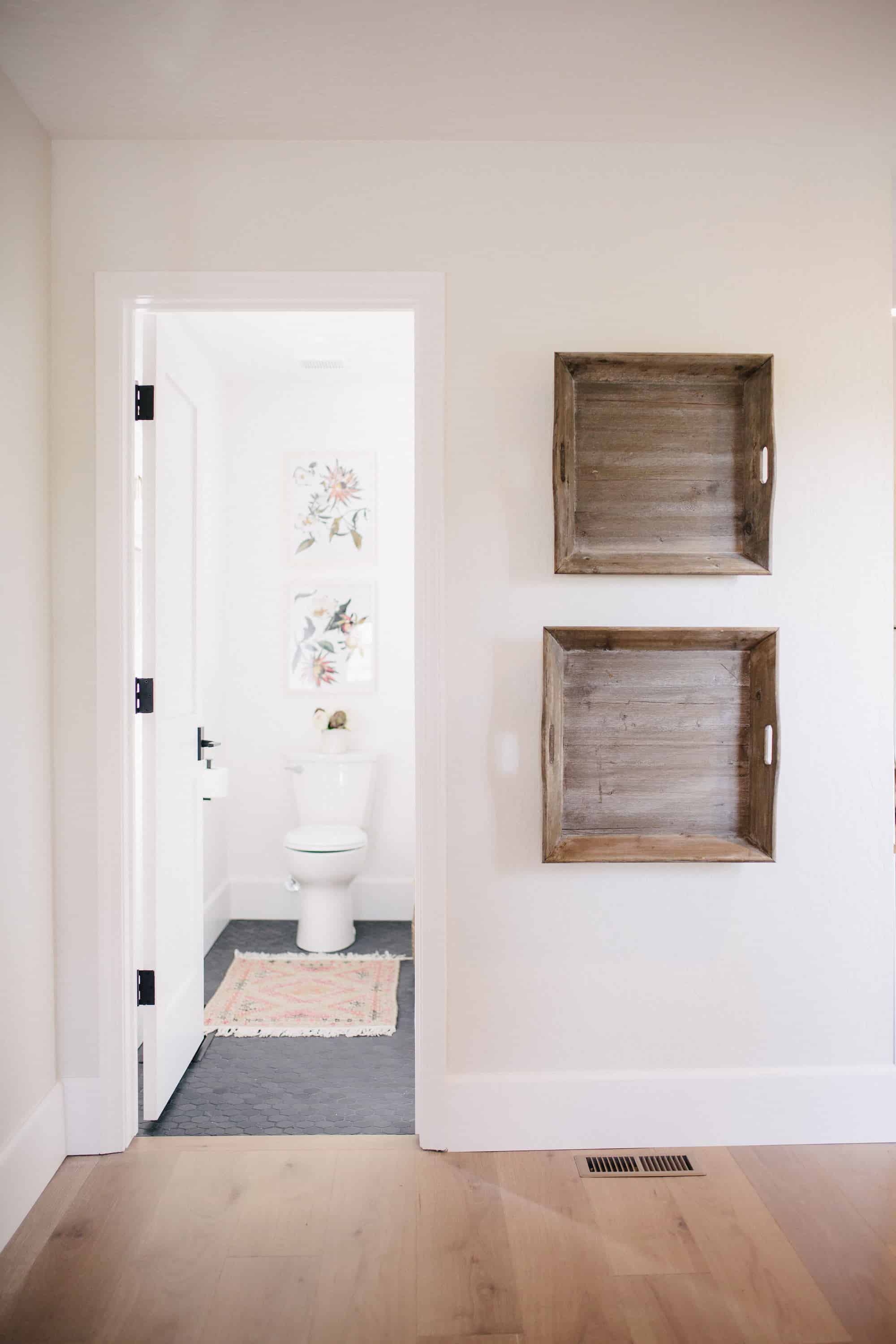 This small bathroom remodel takes shape in a former hallway! You’ll love this small bathroom renovation idea!