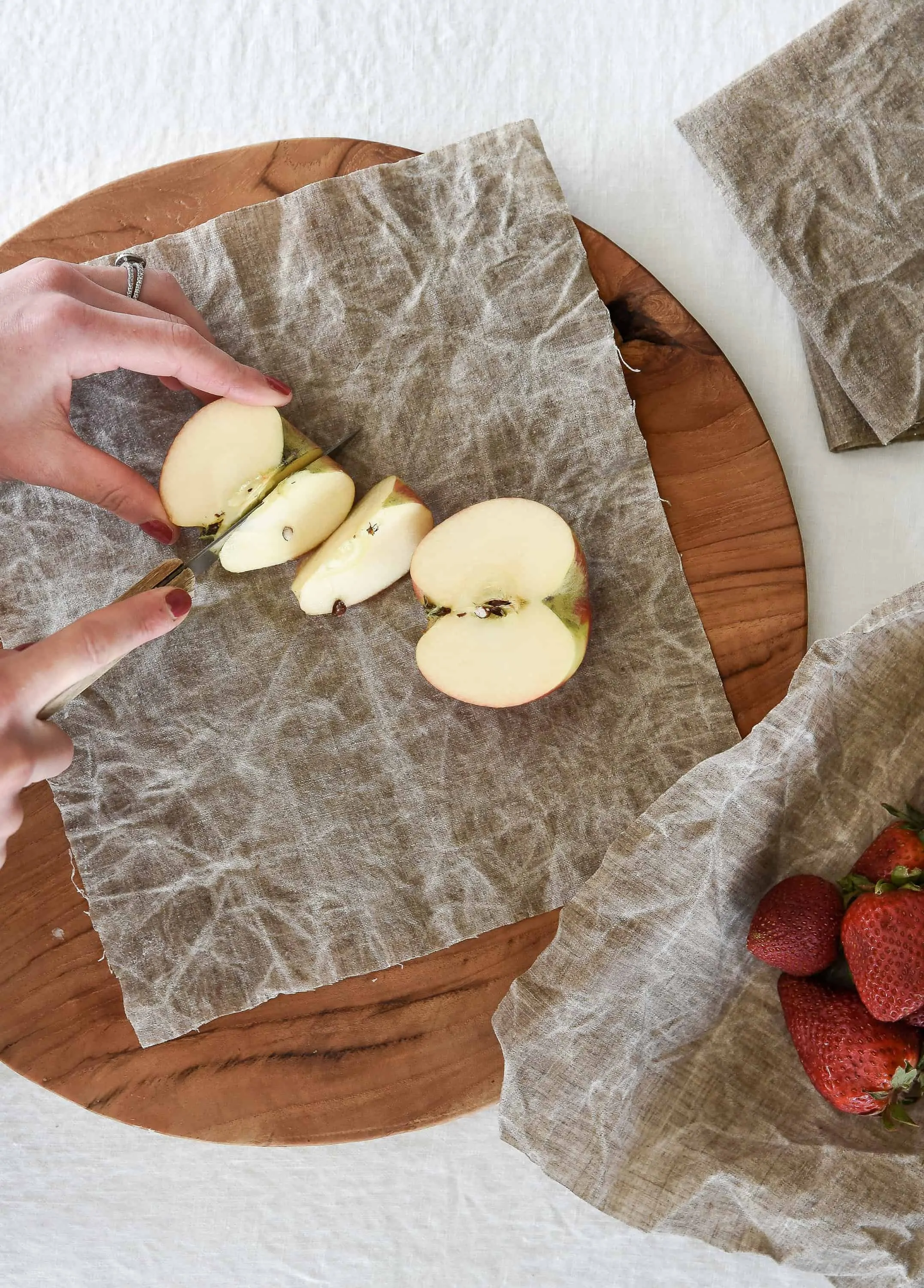 Learn how you can make your own Bee’s Wrap with this DIY beeswax wrap tutorial! This is a great sustainable alternative to plastic wrap!