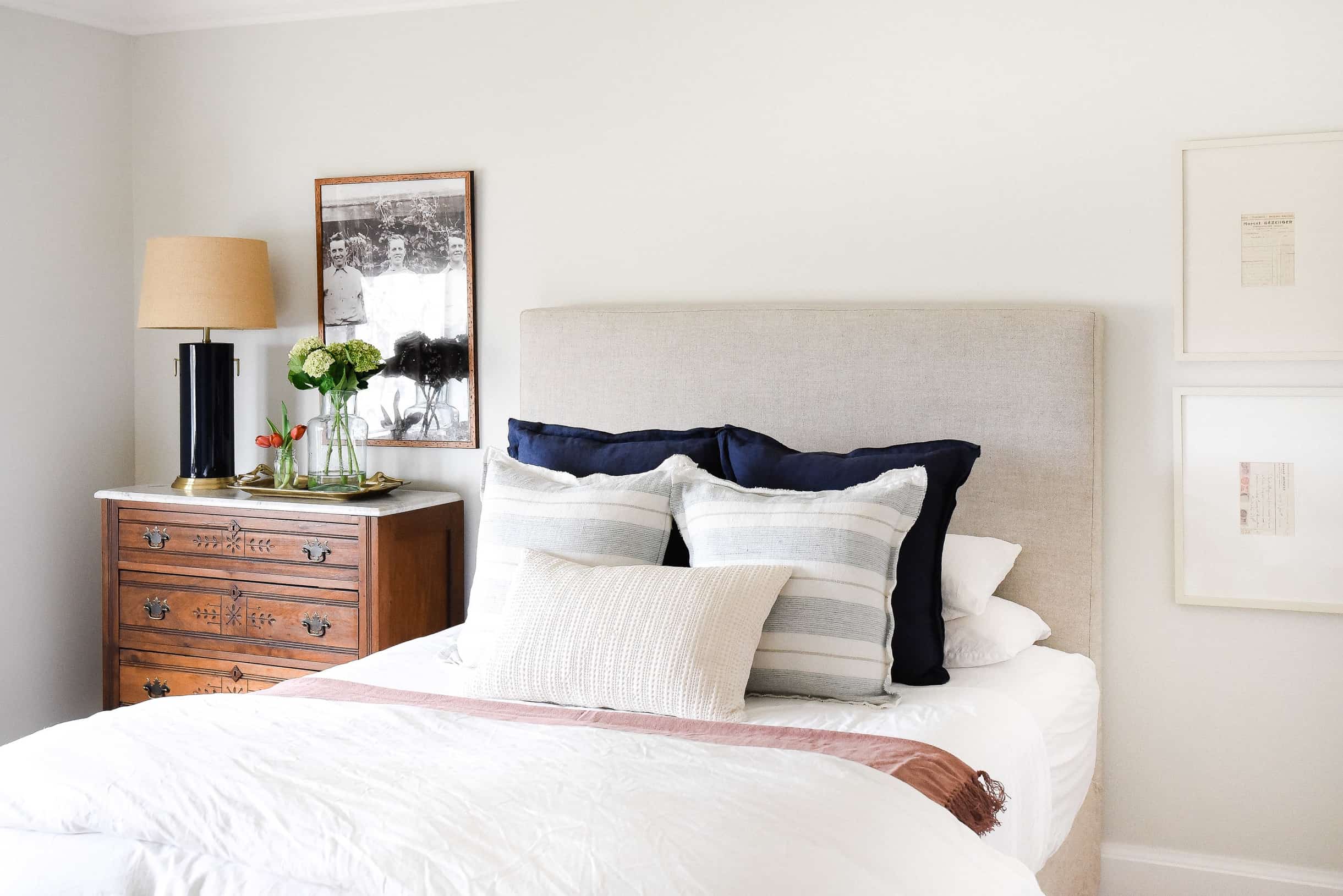 Create a farmhouse bedroom with a mix of antique farmhouse furniture and modern farmhouse decor! 