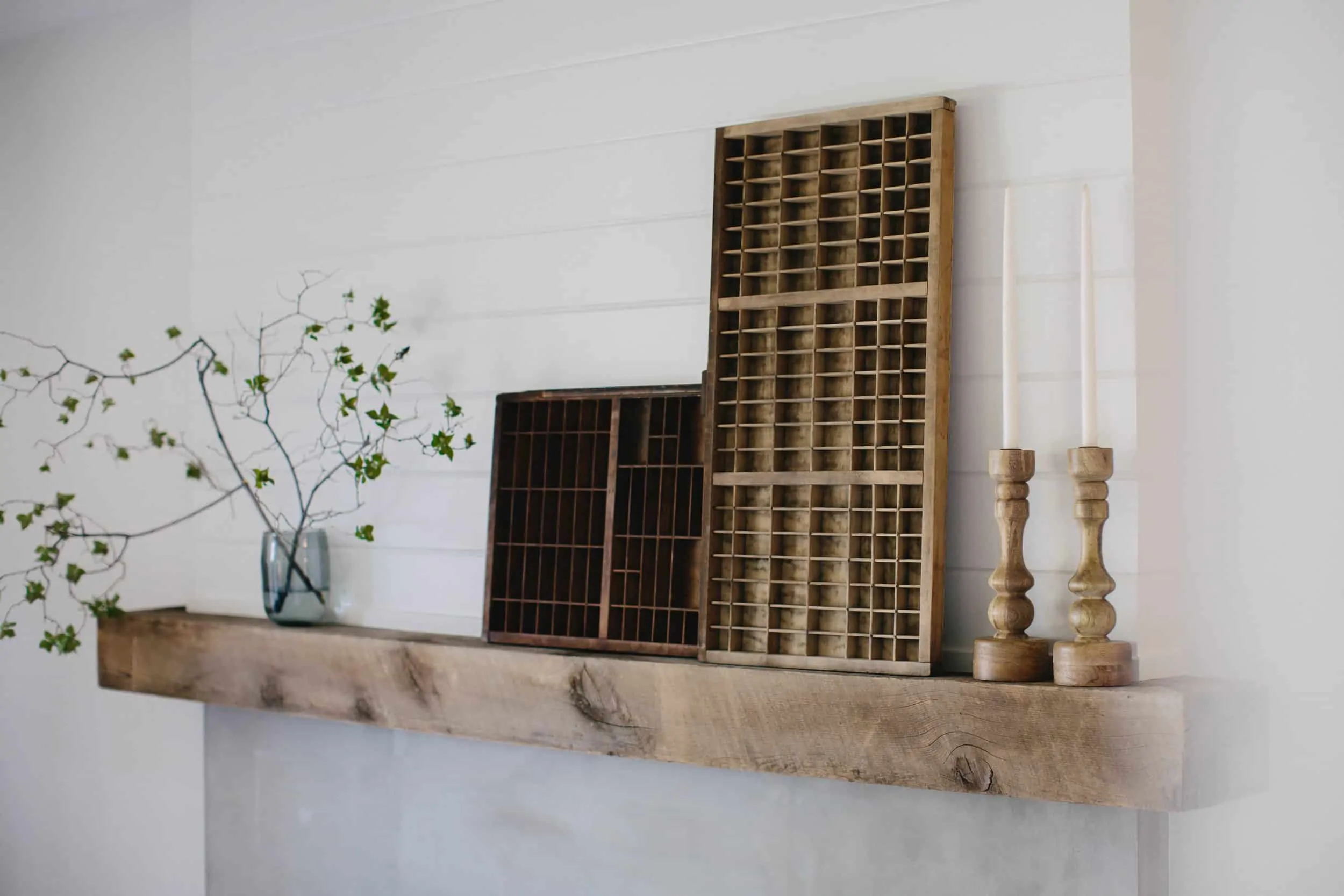 Update an old brick fireplace by using cement! This brick fireplace makeover completely transforms this living room!