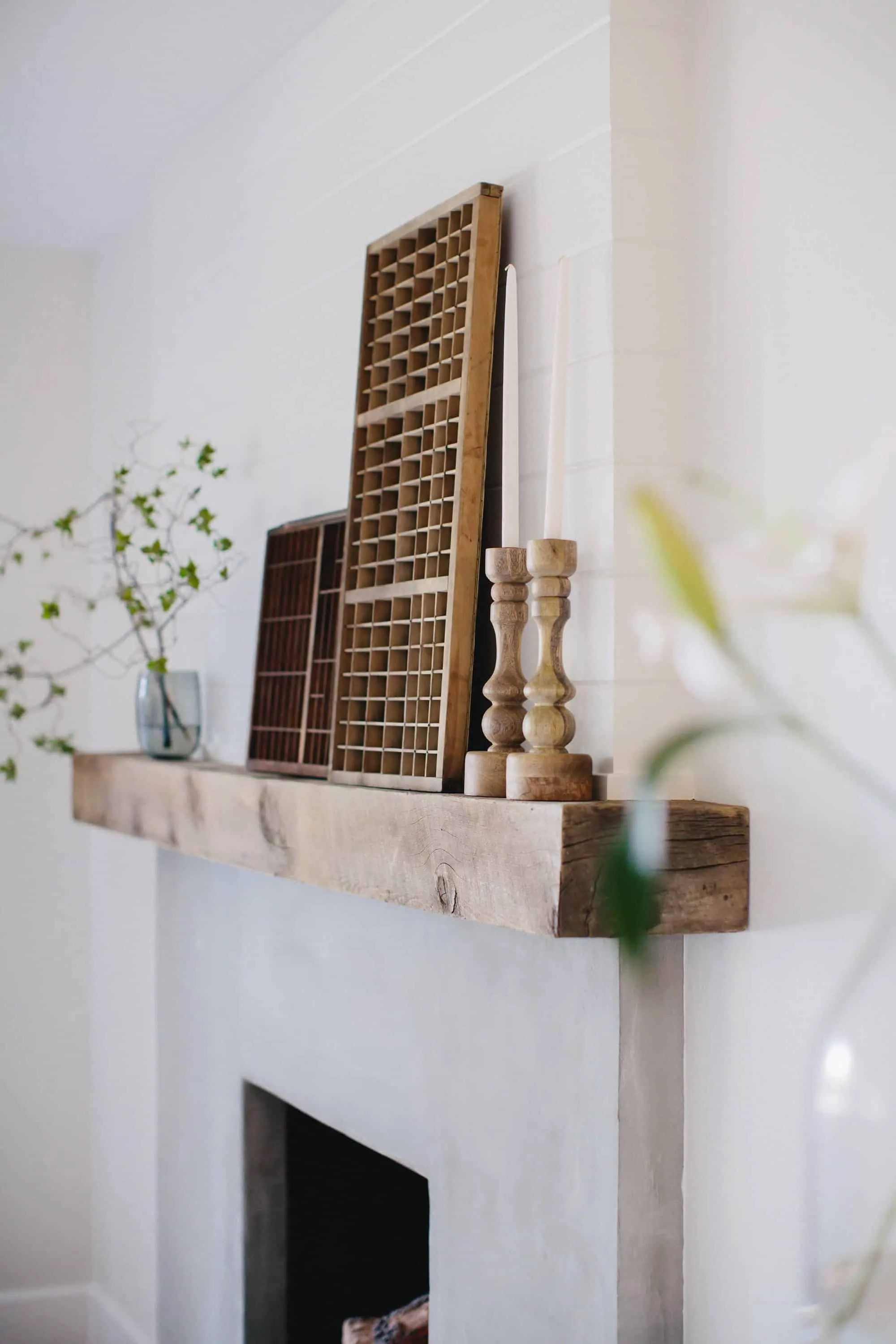 Update an old brick fireplace by using cement! This brick fireplace makeover completely transforms this living room!