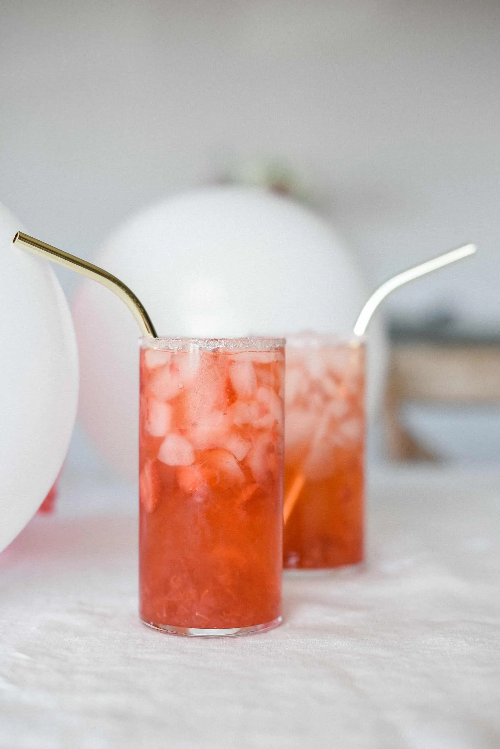 This strawberry champagne cocktail is the perfect thing to serve this Valentine’s Day! Made with crushed strawberries and rosé champagne, you will love this delicious cocktail for Valentine’s Day!