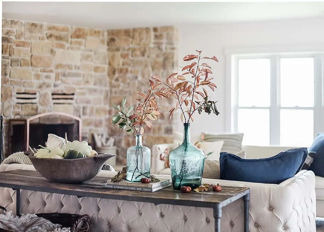 Some simple ways to update your living room this fall with farmhouse inspired decor and vintage touches!