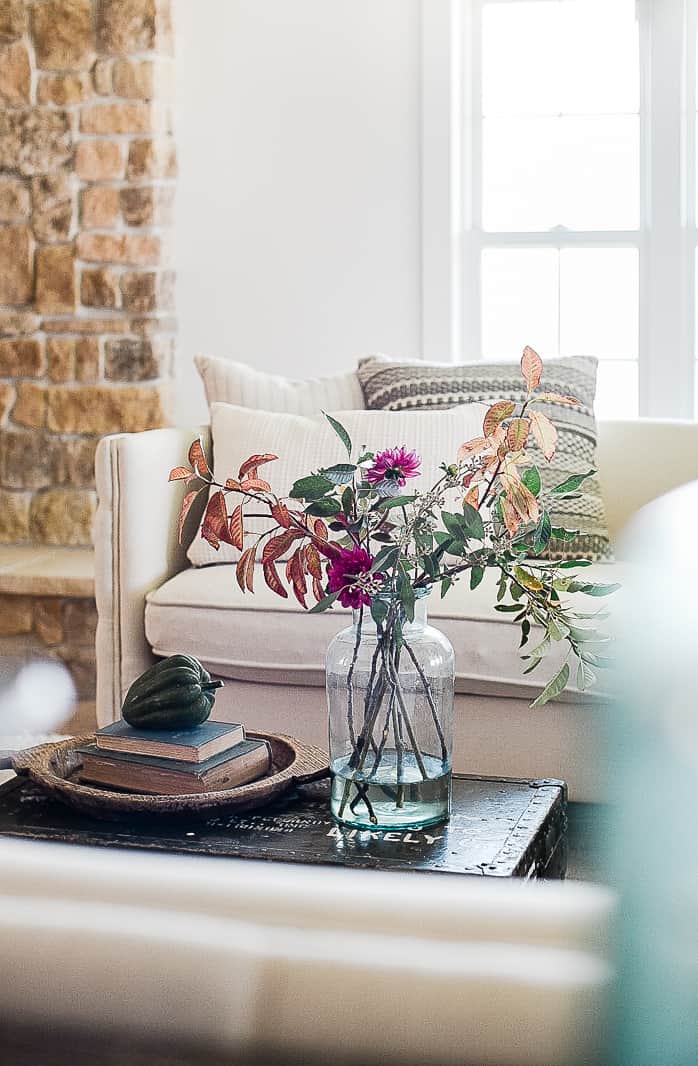 Some simple ways to update your living room this fall with farmhouse inspired decor and vintage touches!