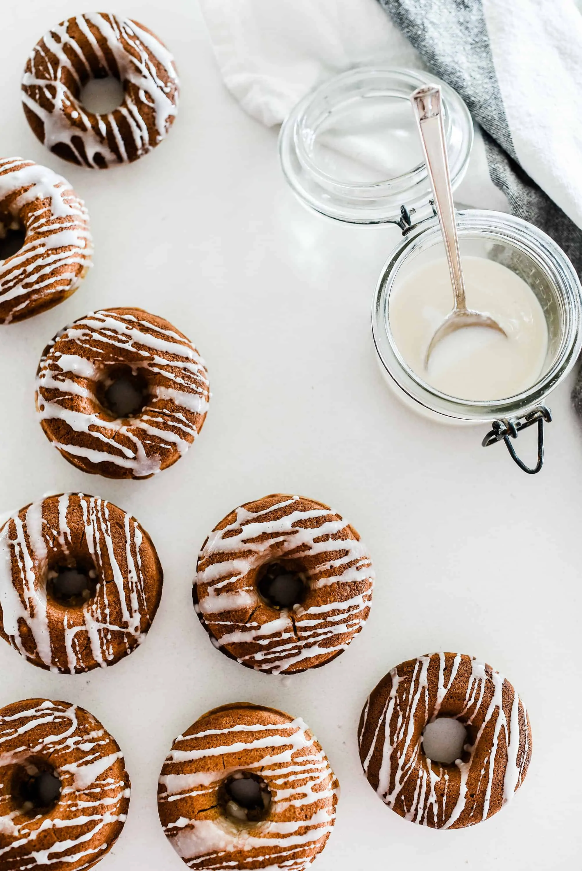 Fall is right around the corner, and that means it’s time to break out the pumpkin recipes! Here are 20 delicious recipes to give a whirl this season – like these baked pumpkin donuts! Will you find a new favorite? 