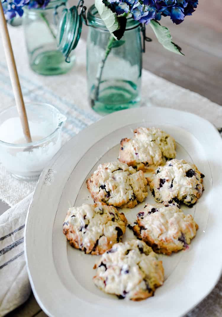 Blueberry scones with a lemon glaze are easy and delicious! A tried and true recipe to keep in your back pocket!