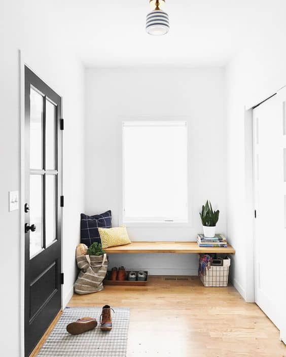 Update a cramped entryway with a built in bench! These built in benches will inspire you to makeover your entryway!