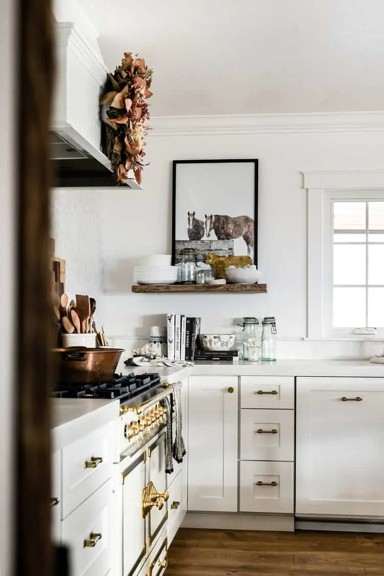 The most common questions I receive about our home, are regarding our kitchen cabinets. Where are they from? What color paint did you use? Do you like them? Well, today I am going to break down every last little bit of our cabinets for you!