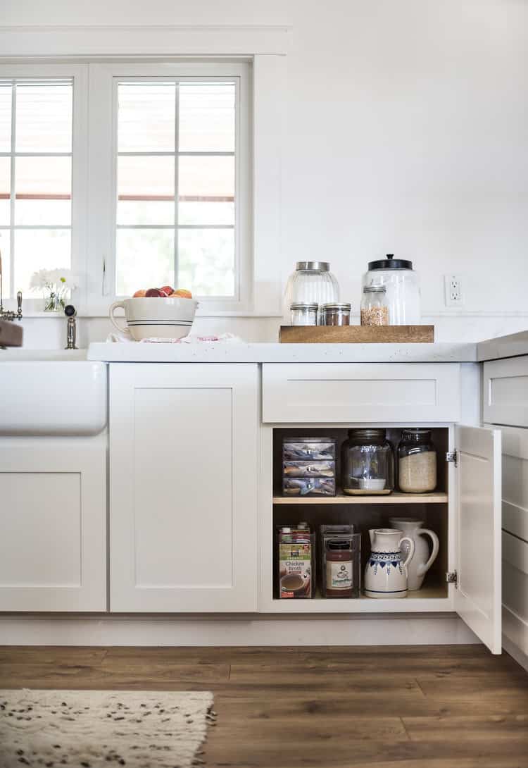 True words of wisdom: "Organization isn’t about perfection, it’s about efficiency, reducing stress & clutter.  It’s about saving time & money, and improving your overall quality of life." ~Christina Scalise When we installed our new kitchen, I knew that I was going to have to keep things very organized. Previously we had so. much. stuff. packed into our cabinets, it was like a treasure hunt trying to find anything. When we moved in, the cabinets were still full with Greg's grandmother's things, and although I donated a lot of it, there was still a whole lot of unnecessary items.  #kitchenorganization #organizationtips #kitchen #organize