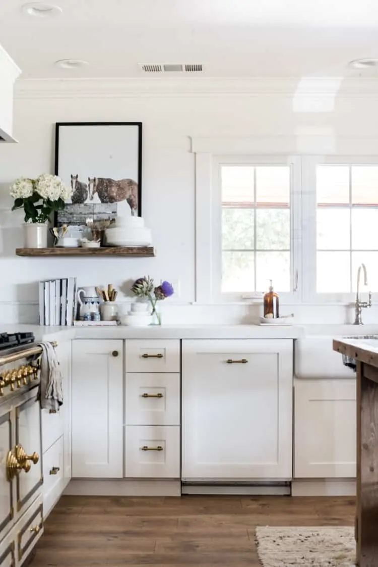 After months without it, we finally have cabinet hardware! We are loving these classic brass pulls from The Home Depot!  #brasscabinethardware #kitchencabinets #kitchencabinethardware #modernfarmhousecabinethardware #kitchenremodel