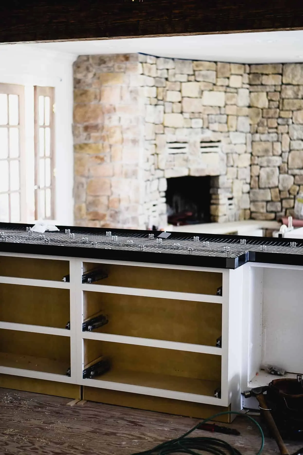What I've learned about white concrete countertops in our kitchen! Should you DIY or hire a professional? Learn all about cement kitchen countertops…let’s go!