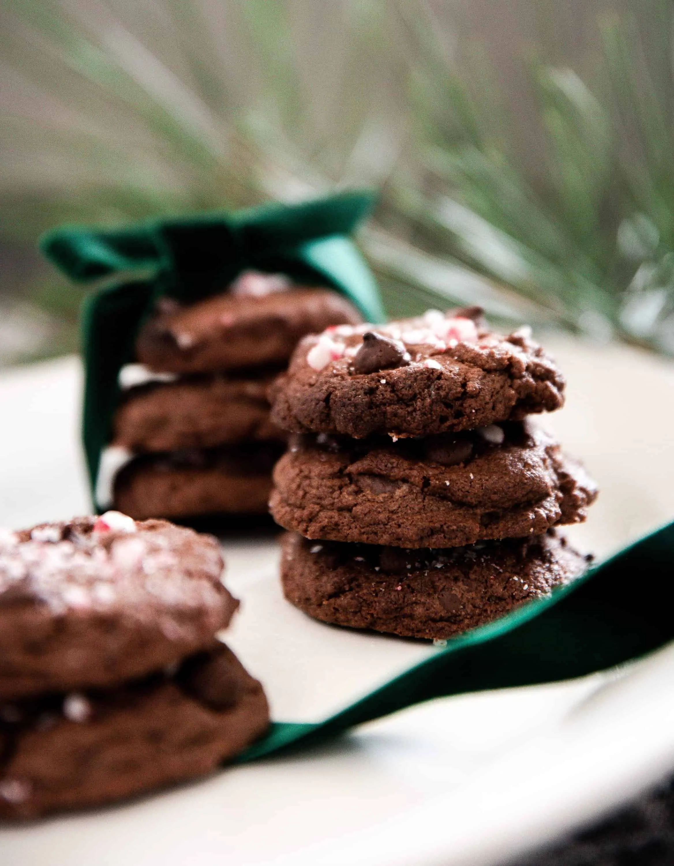 Chewy and delicious chocolate peppermint cookies are packed with cocoa powder, chocolate chips, peppermint extract, and crushed candy cane! There’s a burst of Christmas flavor in every bite!