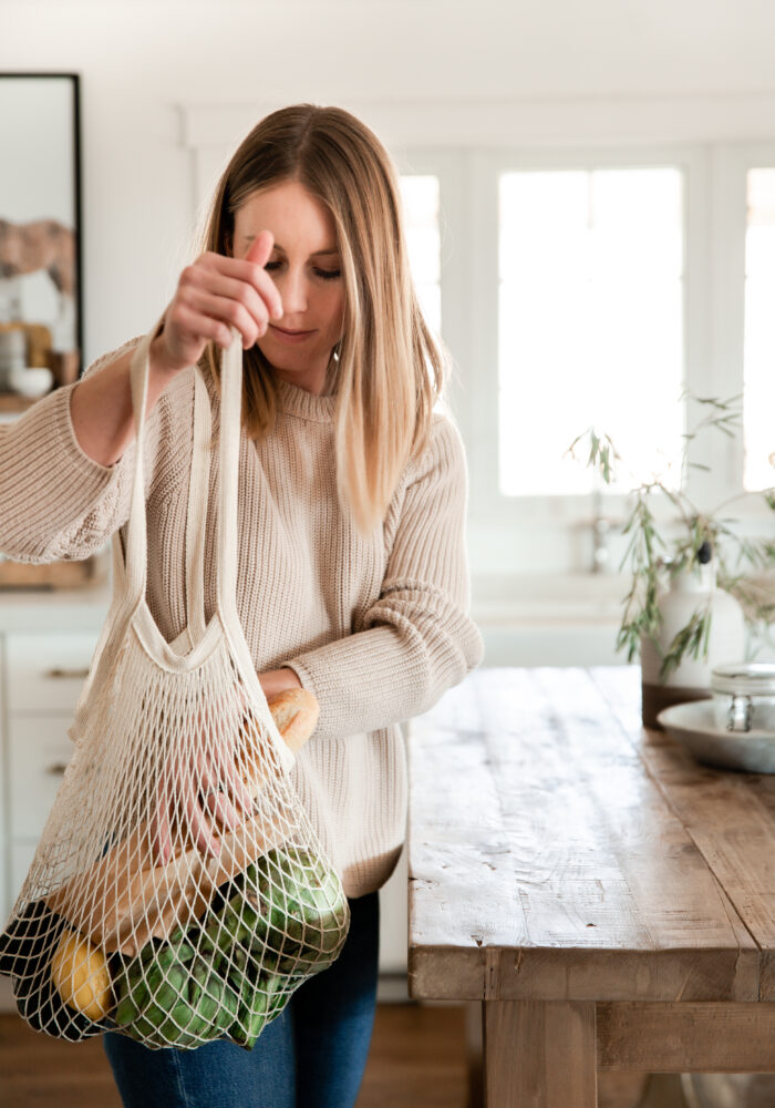 Girl in kitchen with reusable kitchen bag!