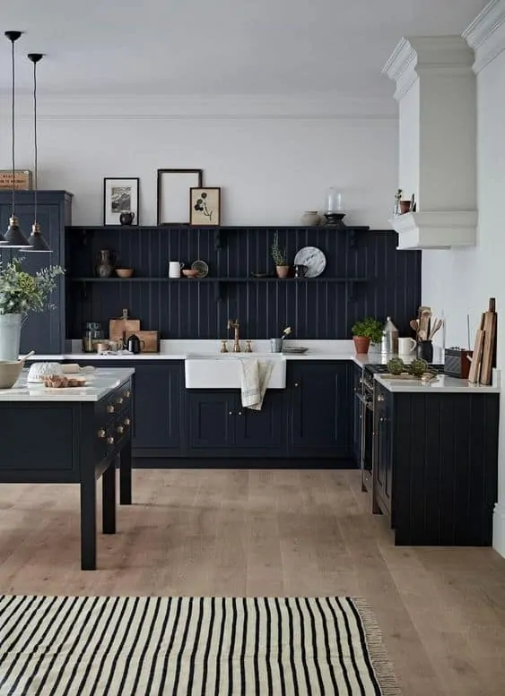 Dark Painted beadboard backsplash with picture ledge