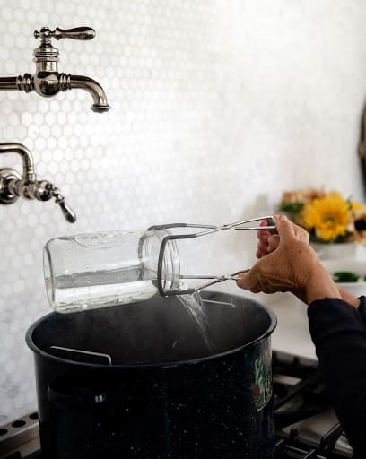 preparing the jars for preserving bread and butter picles