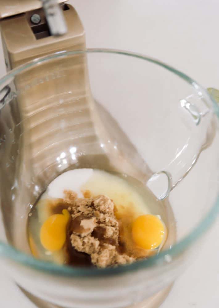 Eggs and sugar in mixing bowl for hot coco cookies