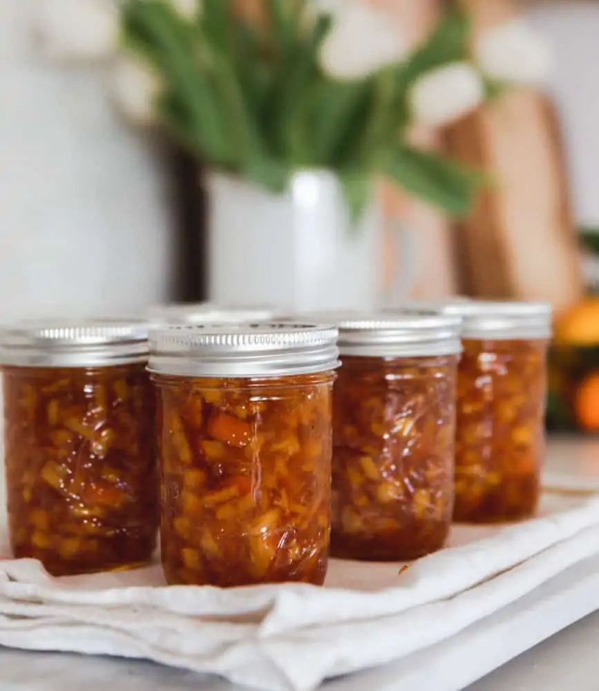 jars of orange marmalade on countertop