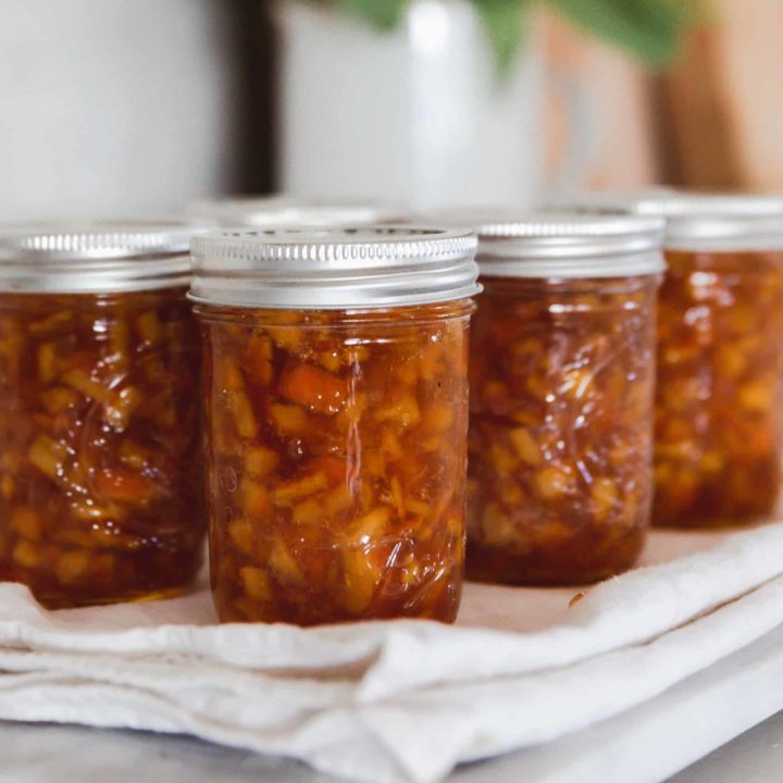 jars of orange marmalade on countertop