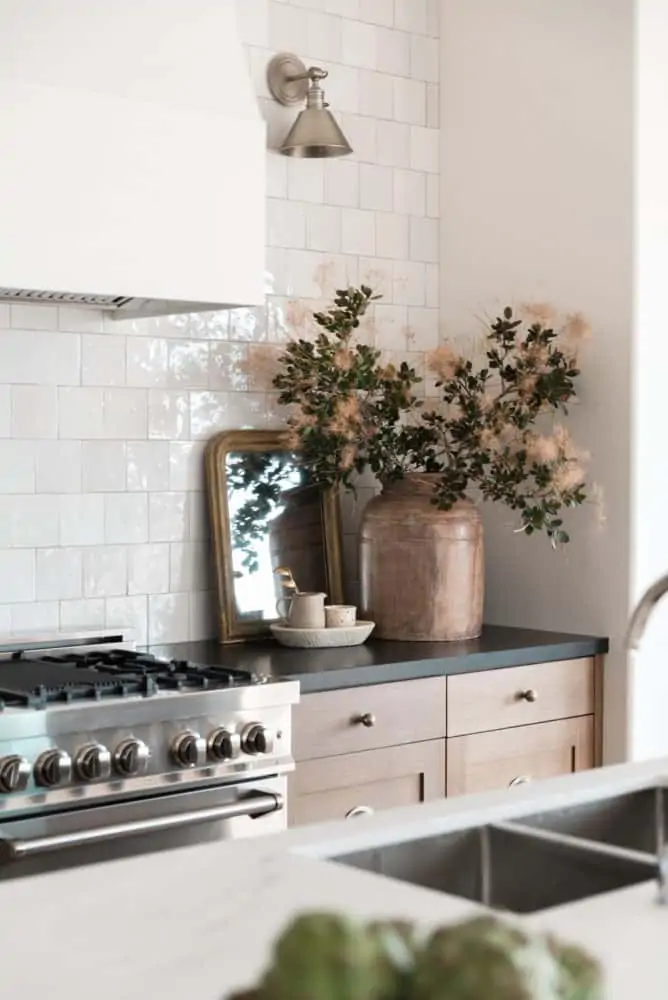Dream kitchen interior design by Boxwood Avenue Interiors with white oak cabinets Cloe backsplash and marble countertops.