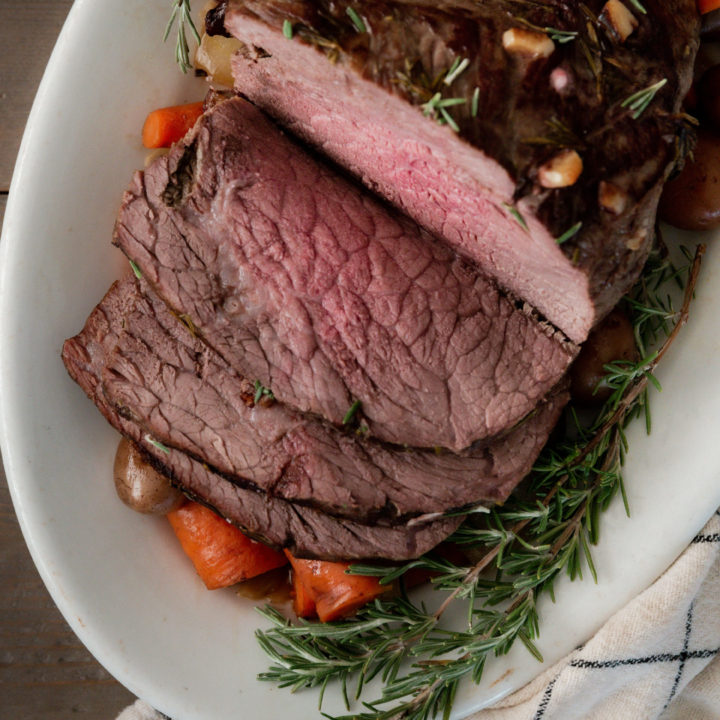 Sliced Rump Roast with rosemary, onions, and carrots