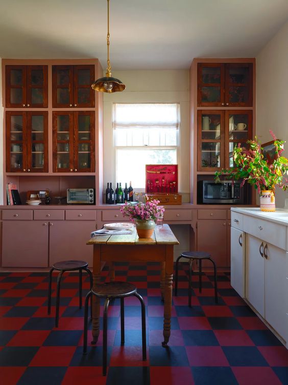 Kitchen Design with checkered red floor from Sophie Donelson