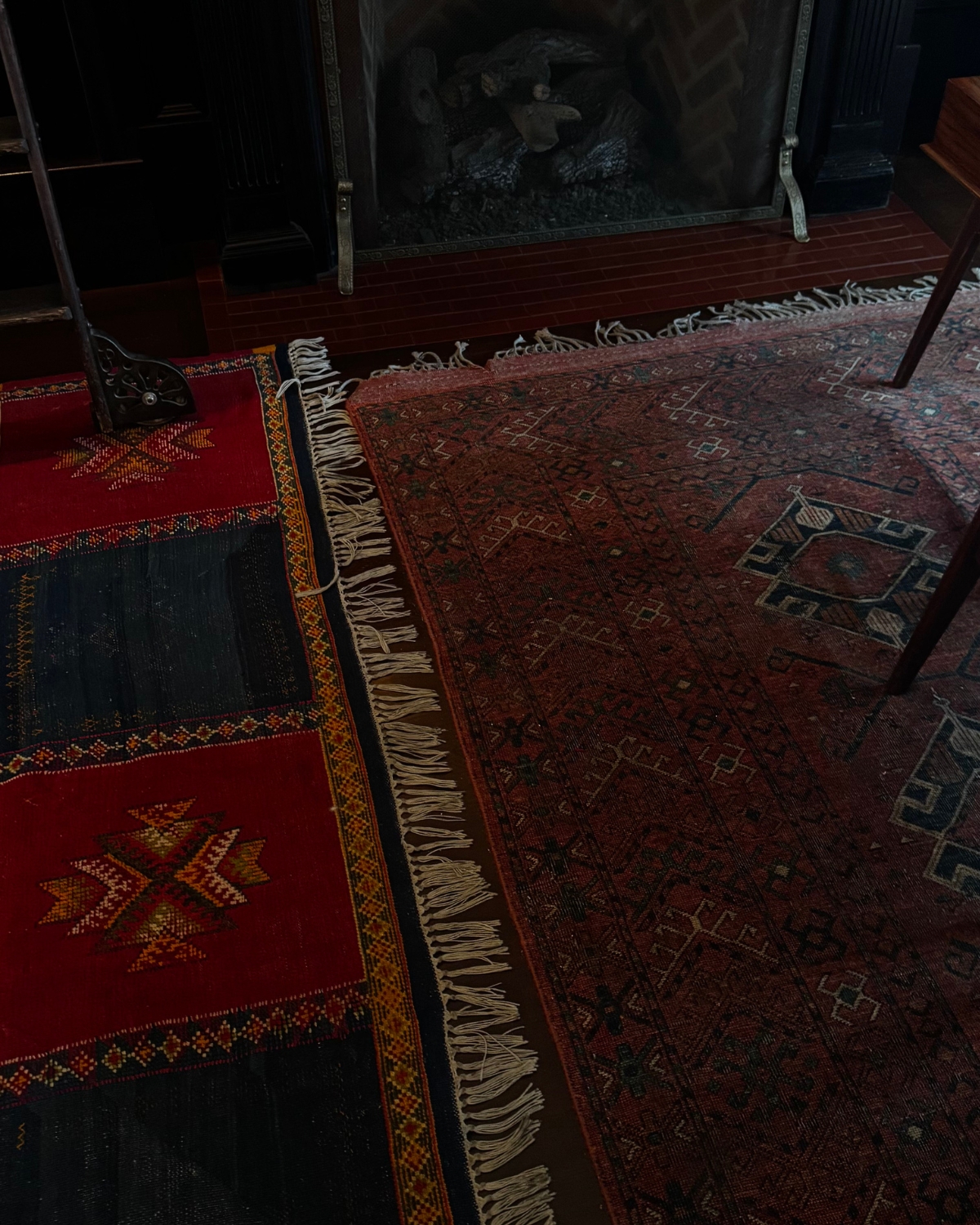 Close-up of beautiful textile rugs featuring intricate patterns and rich colors, adding warmth and texture to a stylish space in Hudson, New York.