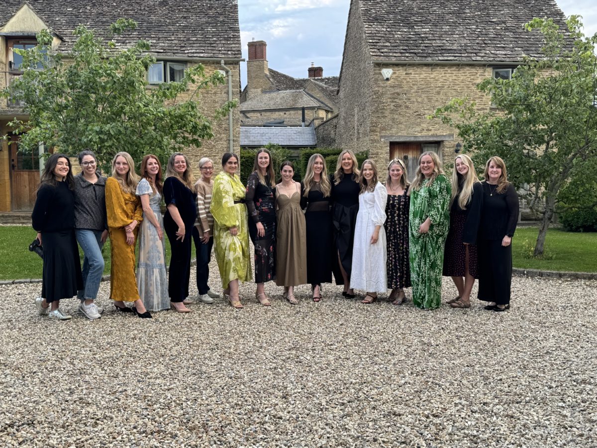 Group photo of retreat attendees in the Cotswolds, capturing a memorable moment together during the Cotswold group trips.