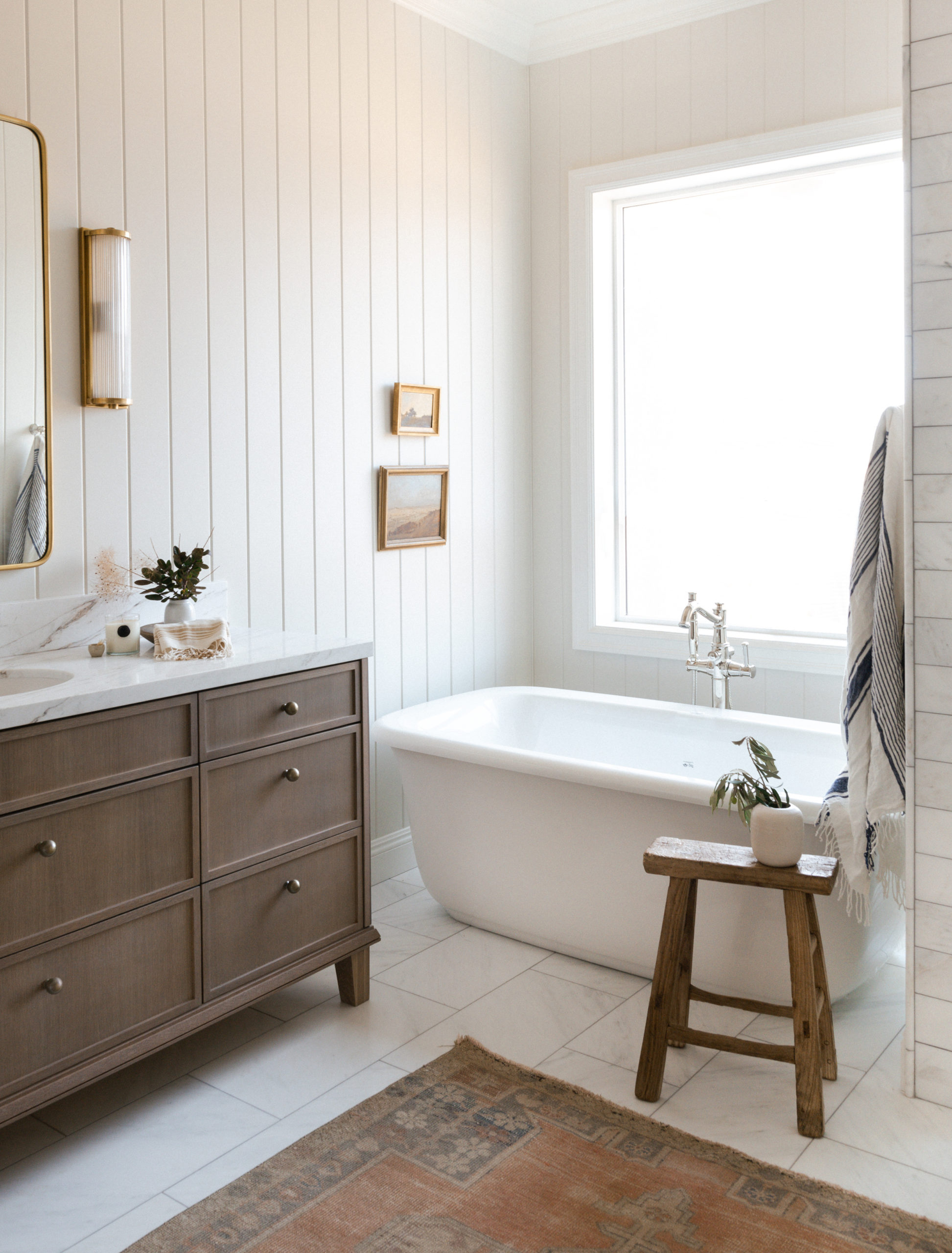 Rain Bathroom with White Shiplap Walls